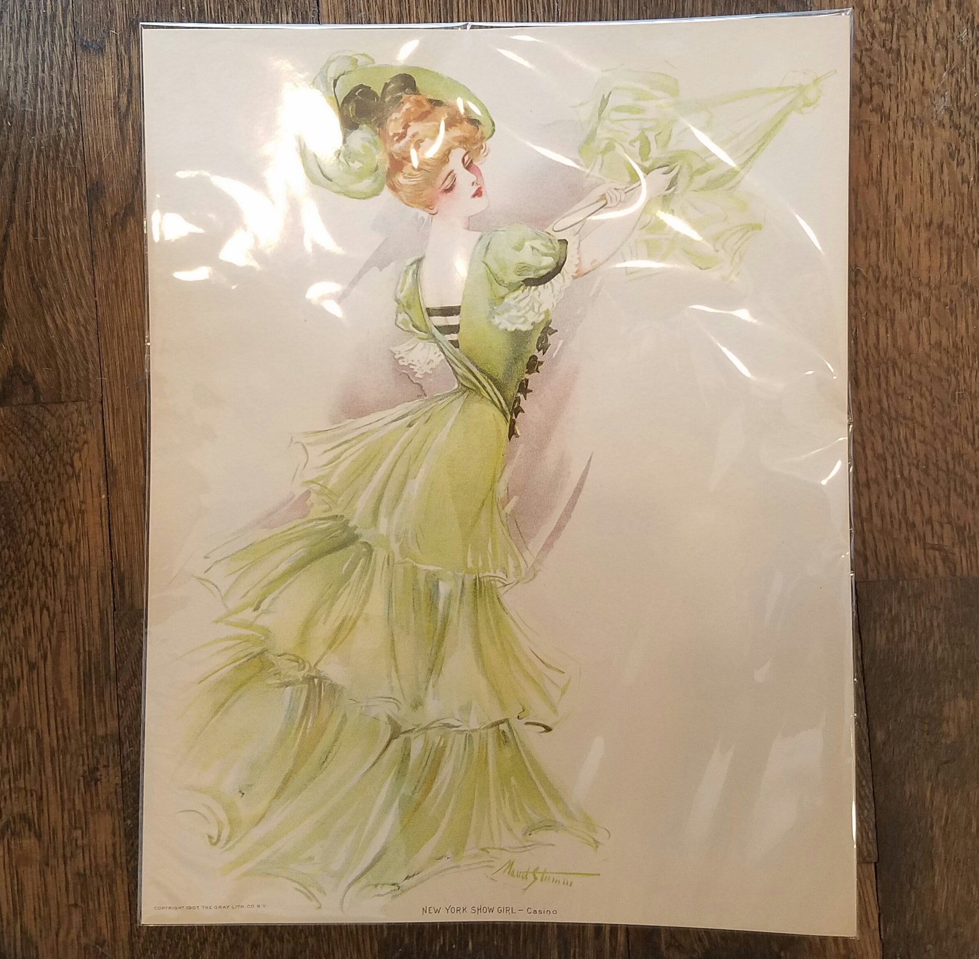 Victorian illustration of a red haired woman with hair in a top bun and a mint green hat. She is wearing a long, mint green gown with layers and puff sleeves and her back is to the front of the pose, with her hip raised slightly. She is gazing down towards her bottom.